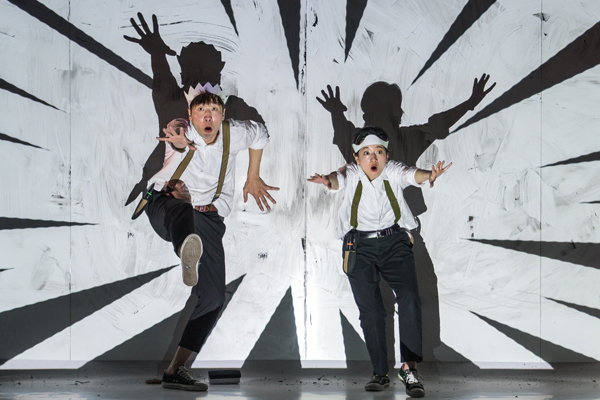 Two kids acting on stage at a fun free event. 