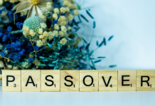 Passover Breakfast: 2 Kid-Approved Recipes for the Week Image: A bouquet of blue dried flowers behind Scrabble tiles spelling out PASSOVER