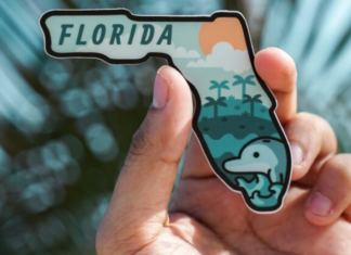 Spring Break Trips: 5 Getaways Near Miami Image: A hand holds a magnet shaped like the state of Florida