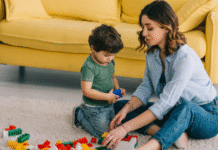 Image: A mother and son playing with Legos