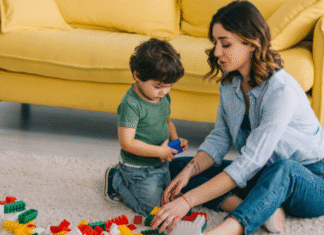 Image: A mother and son playing with Legos