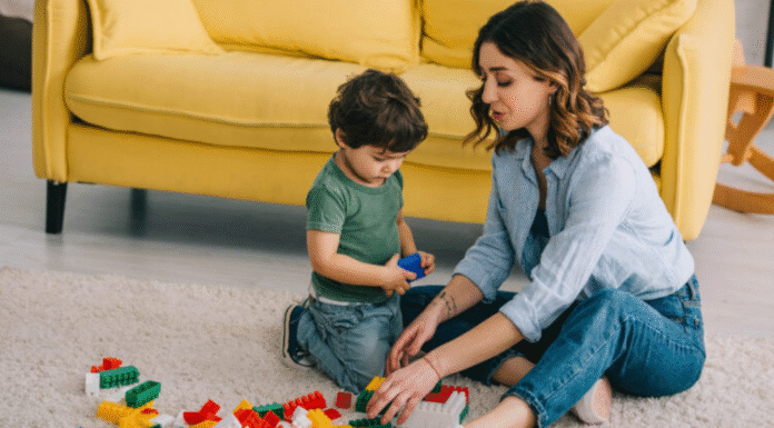 Image: A mother and son playing with Legos