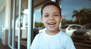 Image: A little boy with a big toothy smile