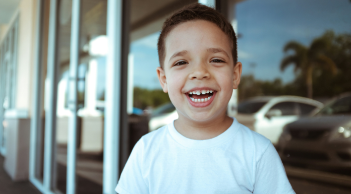 Dental Hygiene: 5 Tips From Dr. Bob Image: A little boy with a big toothy smile