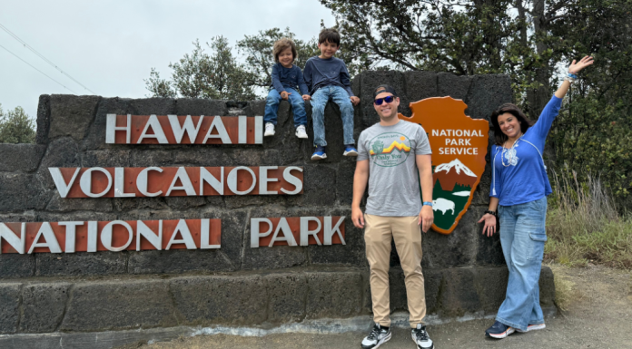 National Public Lands Day: Enjoy Our National Parks for Free Image: A family at the entrance to Hawaii-Volcanoes National Park