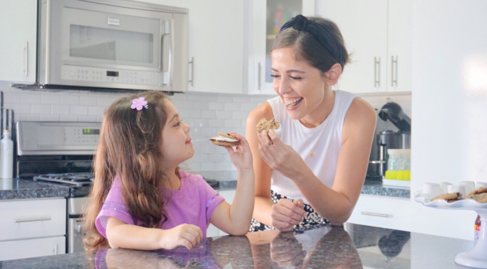 Image: A mother and daughter enjoy some homemade summer-themed treats