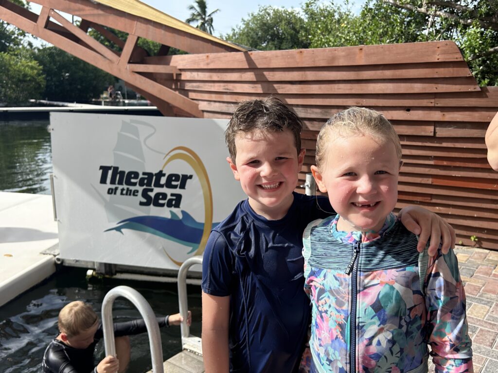 Image: Two children pose for a photo at Theater of the Sea