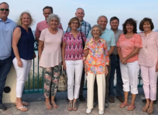 Image: Betty pictured with her children and their spouses