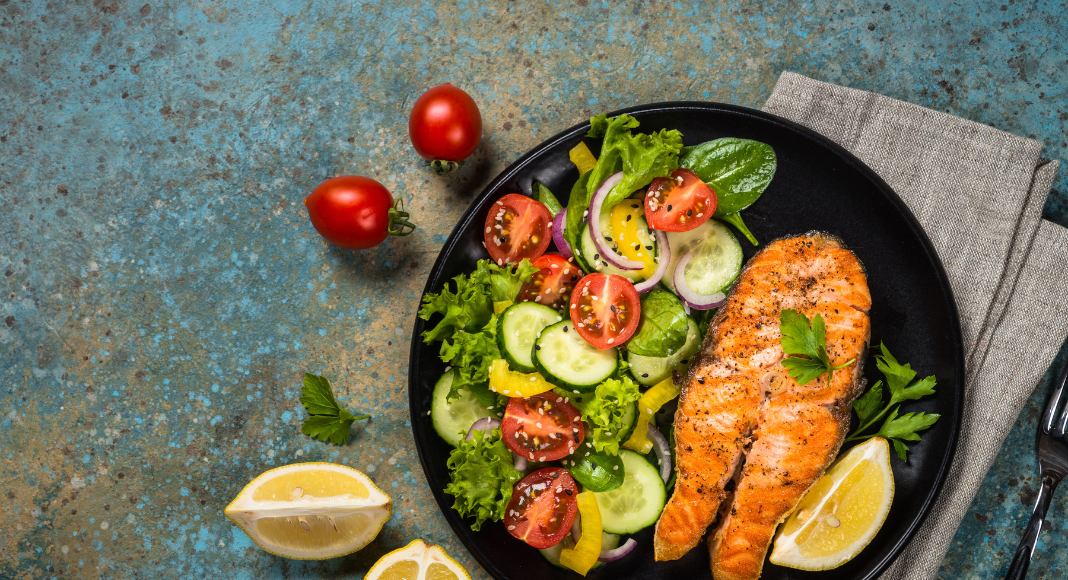 Image: A dinner plate with salmon and salad
