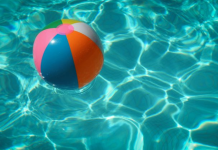 Summer Planning: 4 Tips for Creating Family Rhythms Image: A colorful beach ball floats in a swimming pool