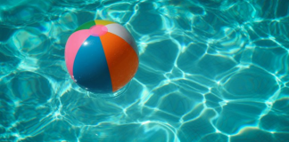 Summer Planning: 4 Tips for Creating Family Rhythms Image: A colorful beach ball floats in a swimming pool