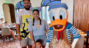 Image: Daniella's family poses for a photo with Donald Duck at Topolino's Terrace restaurant
