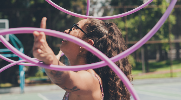 Then, The Washing Machine Breaks… Image: A woman juggles several hula hoops