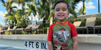 Just Keep Swimming: 3 Tips for Developing Water Safety Skills Image: Daniella's son poses for a photo in a swimming pool