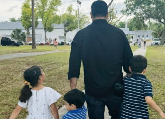 Dad Hacks: 5 Things We Can Learn From Dads Image: A dad walking with his 3 children