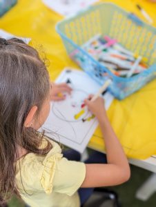 Image: A little girl designs her own squish mallow