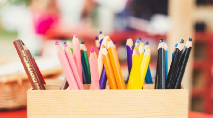 Comic Kids: Join Us for a Morning of Art & Giving Back Image: A wooden box of art supplies on a table