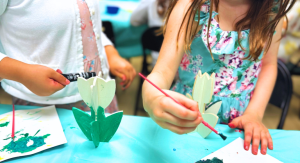 Image: Children pain wooden tulips