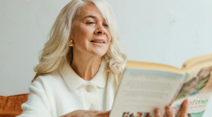 Image: A grandmother reading a book.