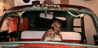Cuban Restaurants: A Roundup Guide to Miami’s Best Image: A mother and son at Cafe la Trova, a local Cuban restaurant in Miami