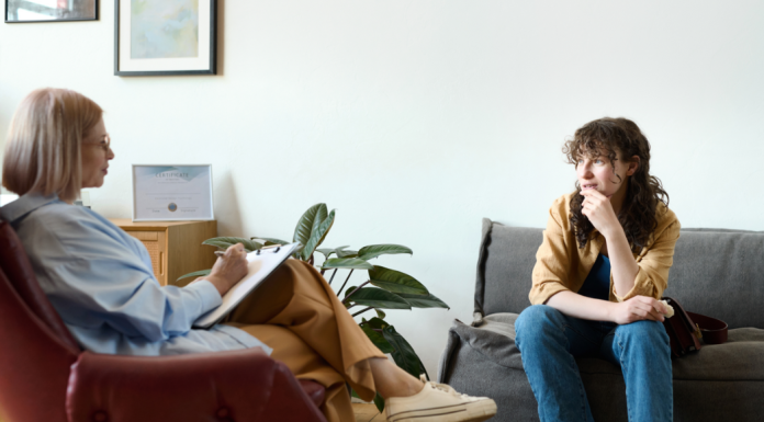 Finding the Right Therapist: How to Take the Guesswork Out of It Image: A therapist sitting with a client