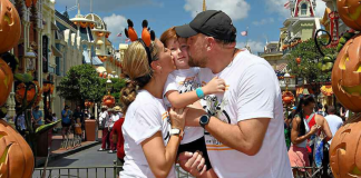 Disney Freebies: Grab One or More (Plus Other Inexpensive Tips) Image: A family poses for a fall-themed photo on Main Street