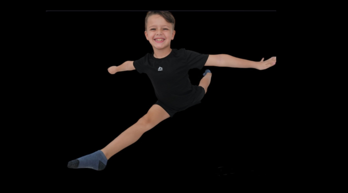 Dance: It’s for Boys, Too Image: Boy in a split