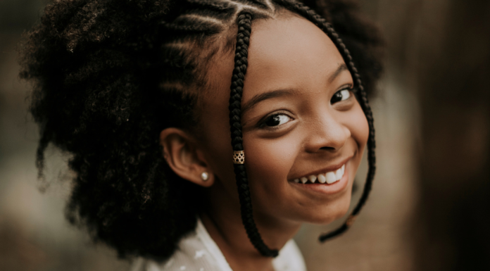 Image: A little girl shows off her smile
