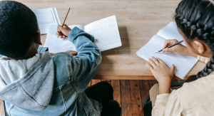 Image: Two classmates hard at work at school
