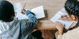 Image: Two classmates hard at work at school