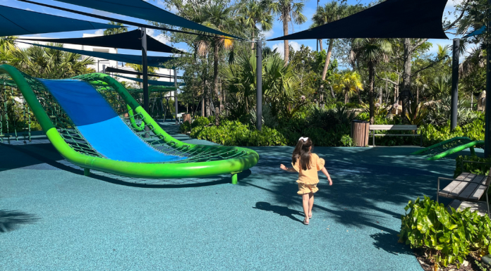 Losner Park in Homestead: Come and Visit! Image: A little girl playing at Losner Park