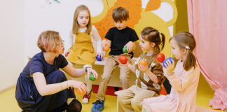 Image: A teacher works with a small group of students who may have IEPs