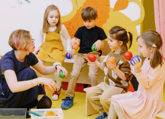 Image: A teacher works with a small group of students who may have IEPs