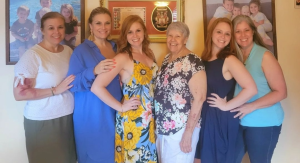 Image: A group of mothers and daughters