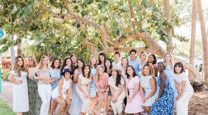 the Miami Mom Collective Team outside under a tree
