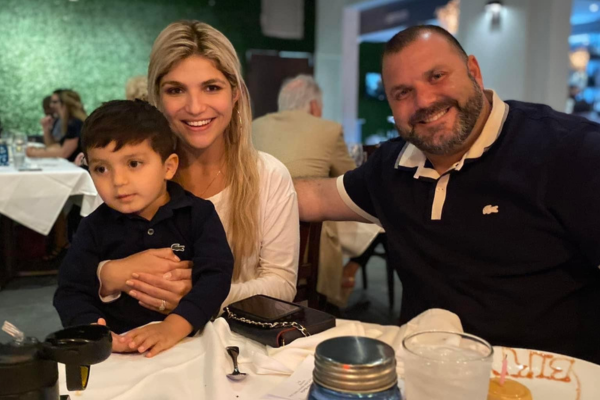 Image: A family enjoying dinner out