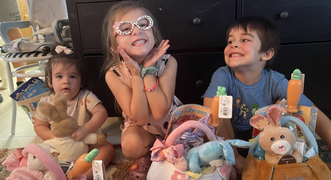 Image: Children enjoying their Easter baskets.