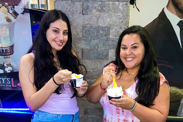 Image: A mother and daughter at a local ice cream shop
