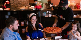 Image: Diana and her family enjoying a meal at Portofino Coal Fired Pizza in Homestead