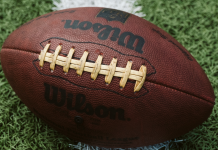 Image: A football on the football field