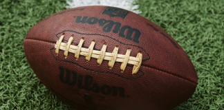 Image: A football on the football field