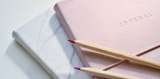 Image: A journal, notebook, and set of pencils