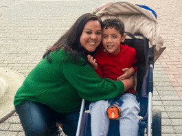 Image of a mother hugging her son on a trip