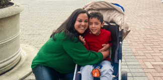 Image of a mother hugging her son on a trip