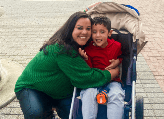 Image of a mother hugging her son on a trip