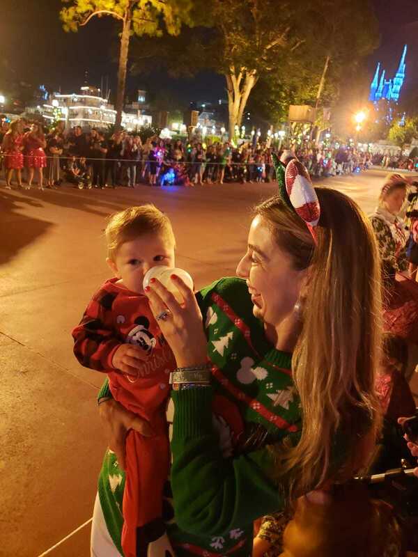Sandra holding 9-month old Marcelo at Disney