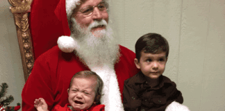 Saint Nicholas: Why I Tell My Kids That Santa is Real Image: A brother and sister visiting Santa Claus for the first time