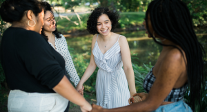 A group of women supporting each other