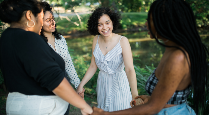 A group of women supporting each other