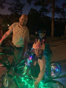 A family riding their bikes